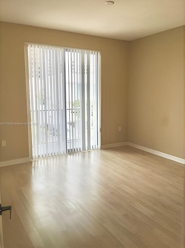 empty room featuring light hardwood / wood-style floors