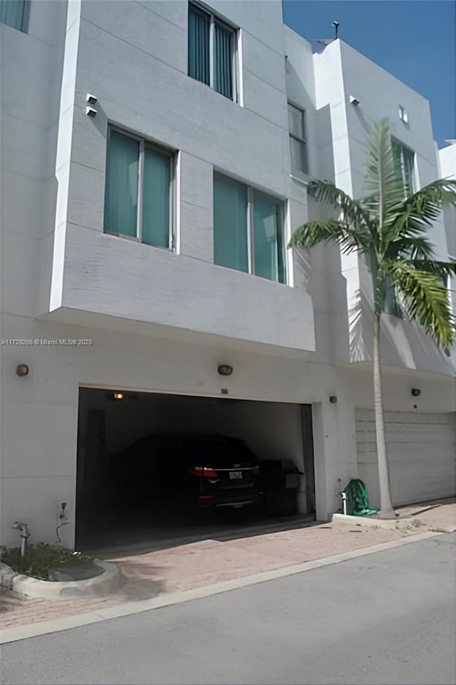 view of building exterior with a garage