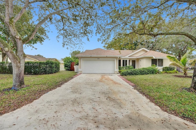 view of front facade featuring a garage and a front yard