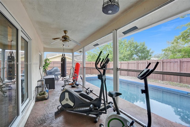 workout room with ceiling fan