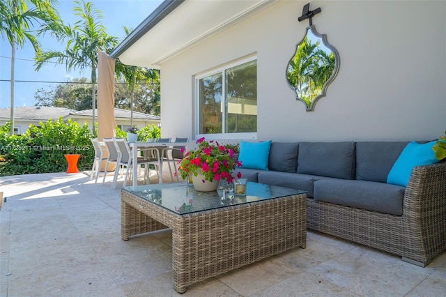 view of patio / terrace featuring outdoor dining space and outdoor lounge area