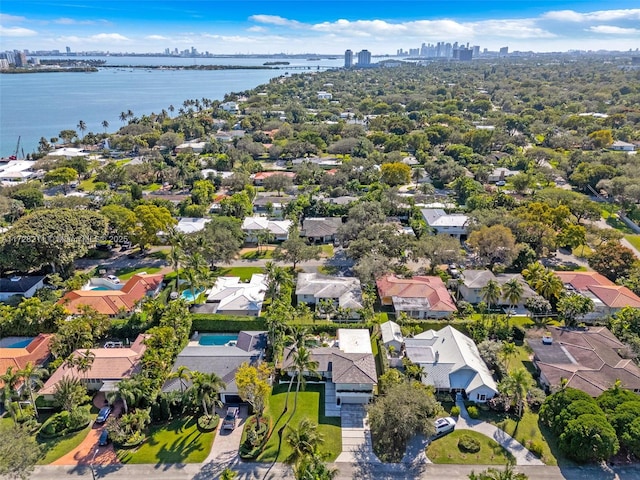 aerial view with a water view and a residential view