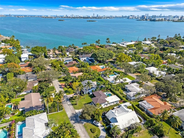 aerial view featuring a residential view and a water view