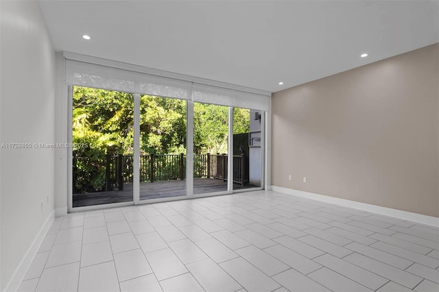 view of tiled spare room