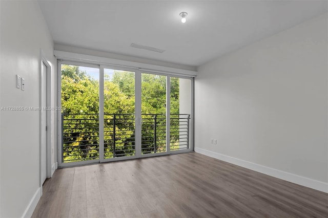 empty room featuring hardwood / wood-style floors