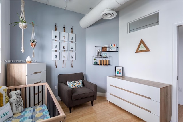 bedroom featuring light hardwood / wood-style floors