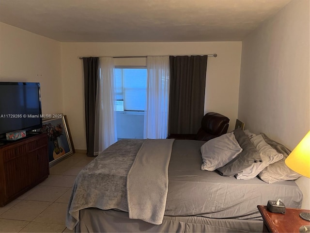 bedroom featuring light tile patterned floors