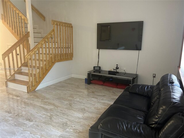 stairway featuring wood-type flooring