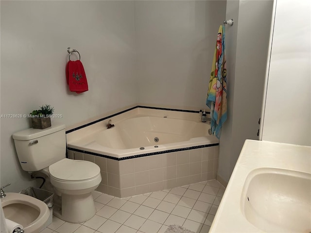 bathroom featuring a bidet, sink, a relaxing tiled tub, tile patterned floors, and toilet