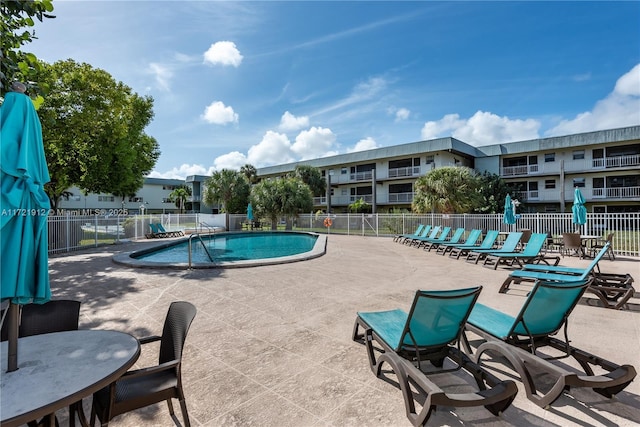 250 Layne Blvd Unit 312, Hallandale Beach, FL 33009 - community pool with a patio
