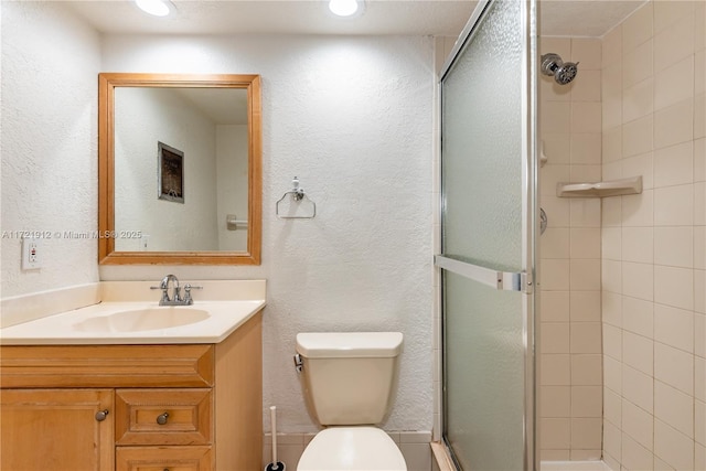 250 Layne Blvd Unit 312, Hallandale Beach, FL 33009 - bathroom with a shower stall, vanity, and a textured wall