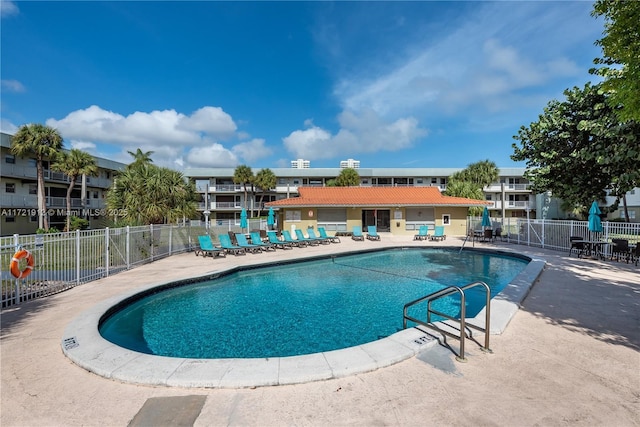 250 Layne Blvd Unit 312, Hallandale Beach, FL 33009 - community pool featuring a patio