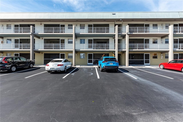 250 Layne Blvd Unit 312, Hallandale Beach, FL 33009 - view of apartment building / complex with uncovered parking