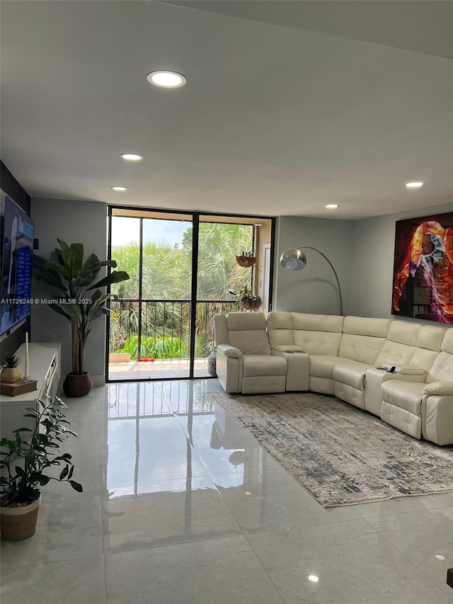 living room with floor to ceiling windows