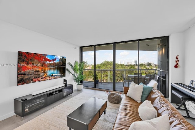 living room with plenty of natural light and a wall of windows