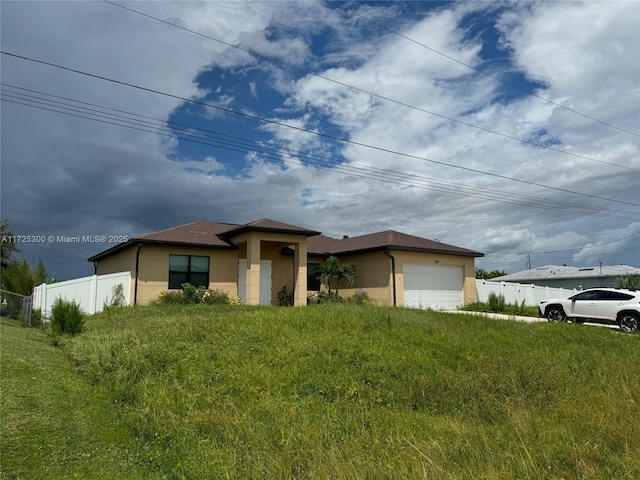 view of front of home featuring a garage