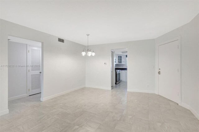 hallway with concrete floors and elevator