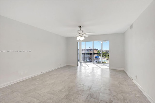 unfurnished room featuring ceiling fan