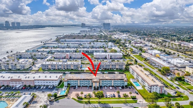 birds eye view of property with a water view