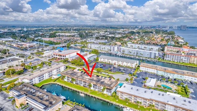 birds eye view of property featuring a water view