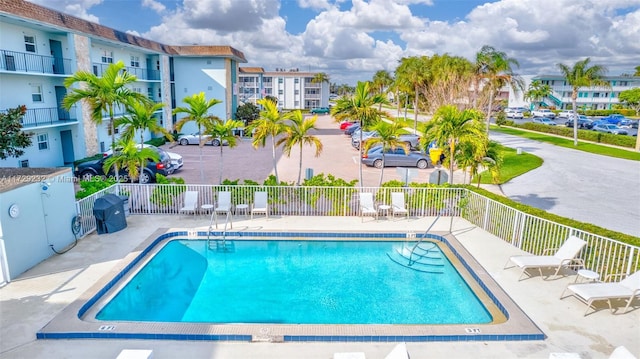 view of swimming pool with a patio