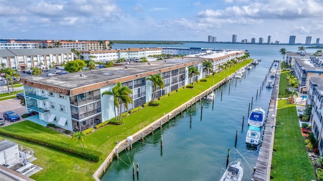 birds eye view of property featuring a water view