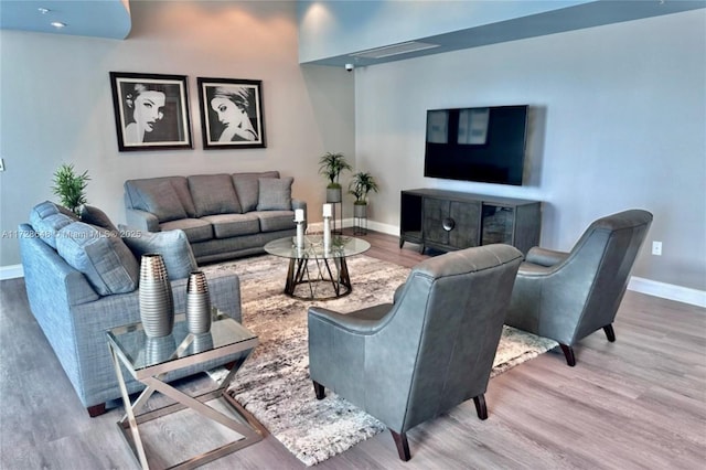 living room with hardwood / wood-style flooring