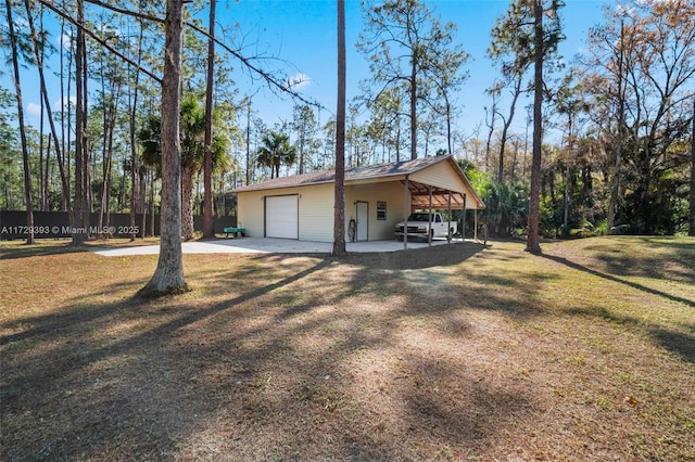 view of property exterior with a lawn, a carport, and a garage