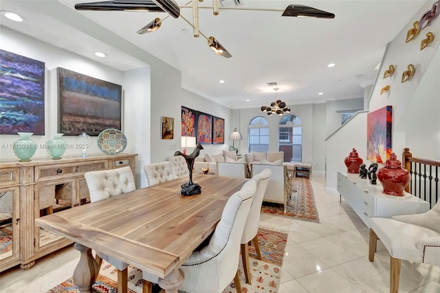 tiled dining area featuring an inviting chandelier