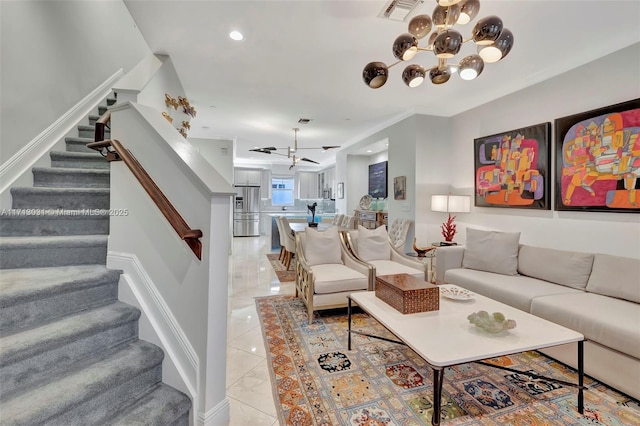 1033 NE 17th Way Unit 704, Fort Lauderdale, FL 33304 - living area featuring a chandelier and stairs
