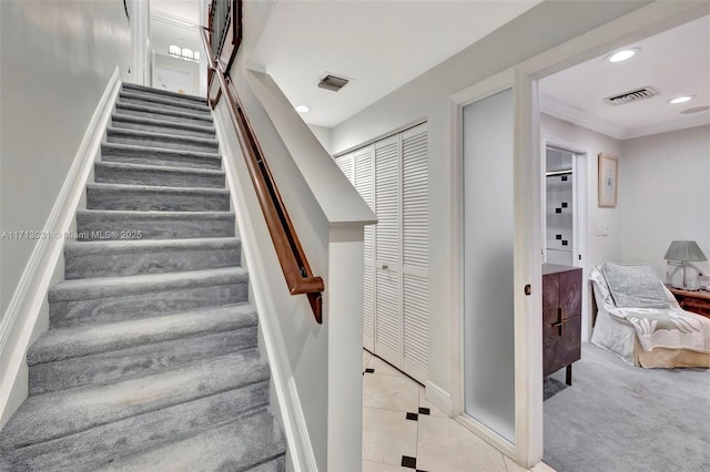 1033 NE 17th Way Unit 704, Fort Lauderdale, FL 33304 - stairway featuring recessed lighting, tile patterned flooring, and carpet flooring