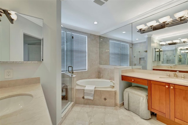 1033 NE 17th Way Unit 704, Fort Lauderdale, FL 33304 - full bathroom with a garden tub, a stall shower, two vanities, crown molding, and recessed lighting