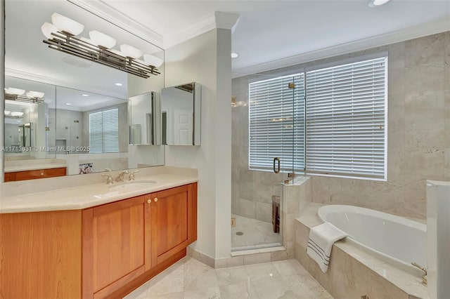 bathroom with independent shower and bath, ornamental molding, and vanity