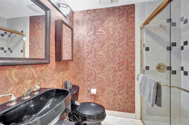 1033 NE 17th Way Unit 704, Fort Lauderdale, FL 33304 - full bath with wallpapered walls, a stall shower, and marble look tiles