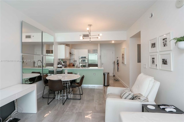 dining space featuring a chandelier