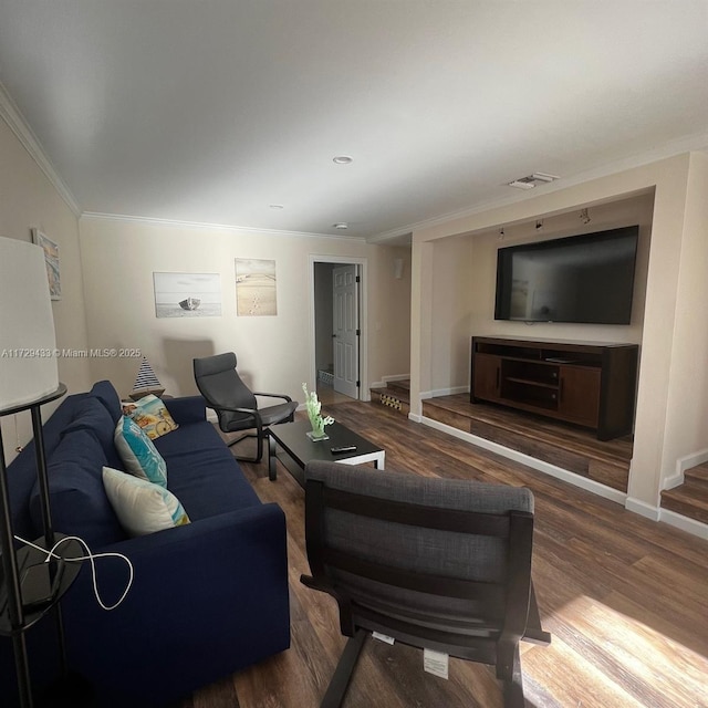 living room featuring ornamental molding and dark hardwood / wood-style floors