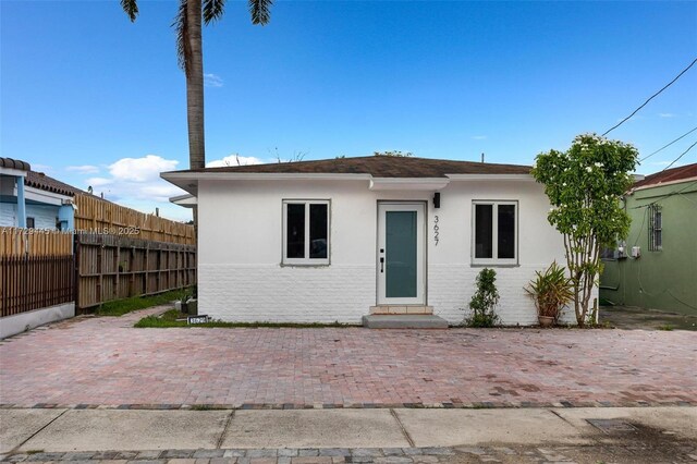 view of front of home with a patio area