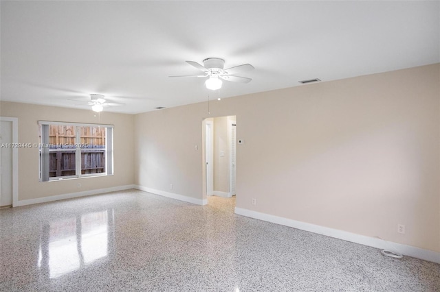 spare room featuring ceiling fan