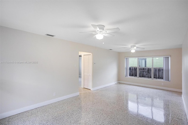 spare room featuring ceiling fan