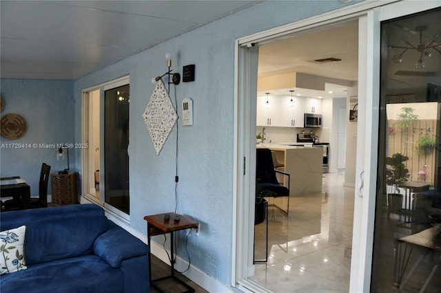 living room featuring sink