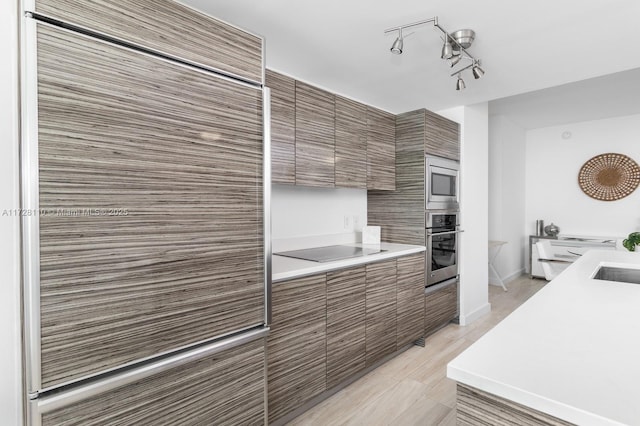 kitchen with sink and stainless steel appliances