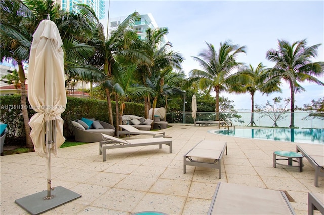 view of pool featuring a patio