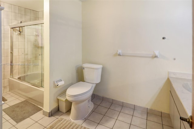 full bathroom with toilet, tile patterned floors, vanity, and enclosed tub / shower combo