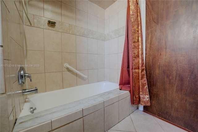 bathroom featuring tile patterned flooring and shower / bath combination with curtain