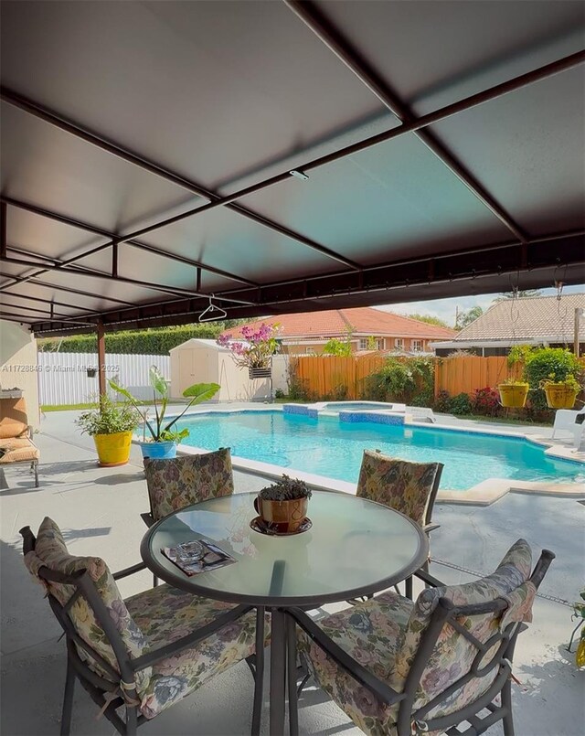 view of pool featuring a patio