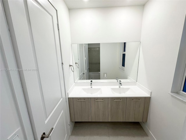 bathroom featuring tile patterned floors and vanity