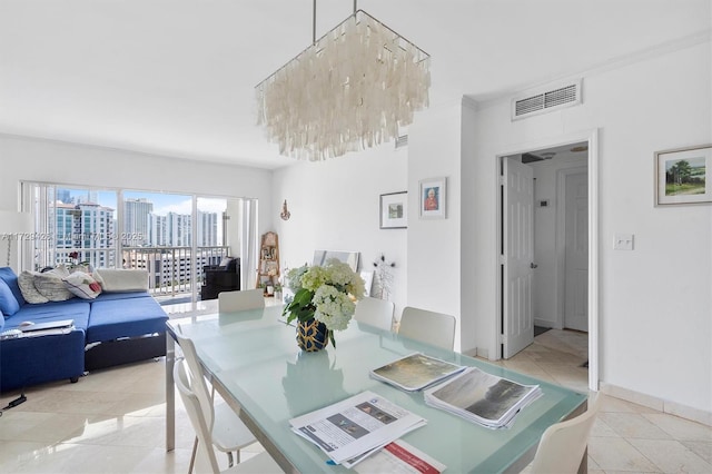 300 Bayview Dr Unit 1503, Sunny Isles Beach, FL 33160 - dining area with light tile patterned floors