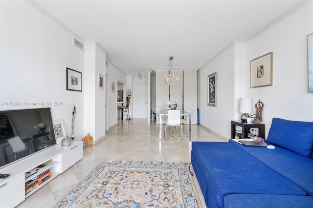 300 Bayview Dr Unit 1503, Sunny Isles Beach, FL 33160 - living room featuring a chandelier and light tile patterned flooring