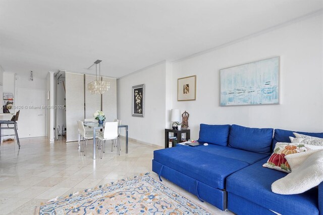 300 Bayview Dr Unit 1503, Sunny Isles Beach, FL 33160 - living room featuring a chandelier