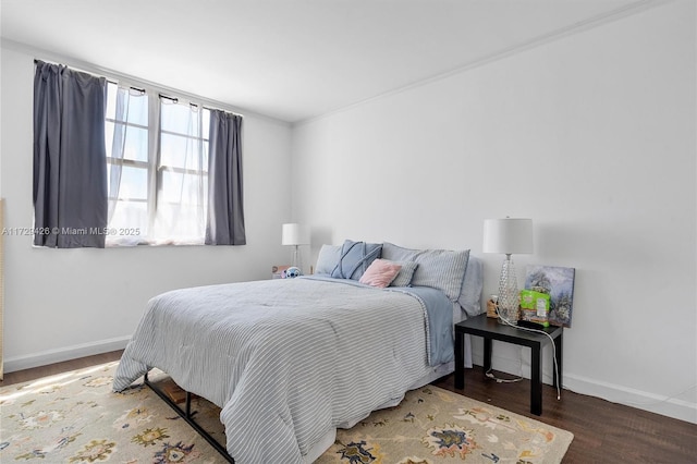 300 Bayview Dr Unit 1503, Sunny Isles Beach, FL 33160 - bedroom with baseboards and wood finished floors